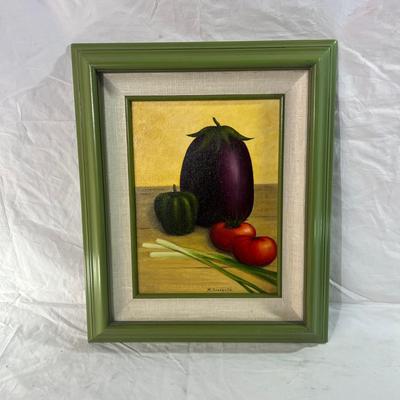 Bright green painted wood frame with oil painting of veggies
