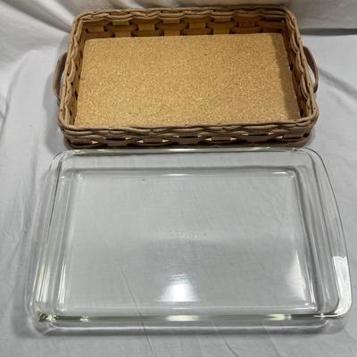 Two Vintage Pyrex dishes with woven basket