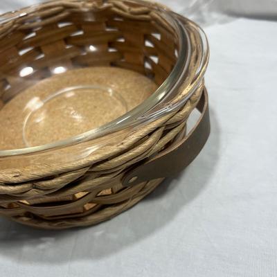Two Vintage Pyrex dishes with woven basket
