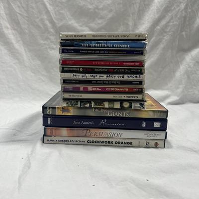 An assortment of DVD's, Cd's, and video Games