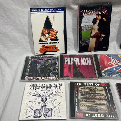 An assortment of DVD's, Cd's, and video Games