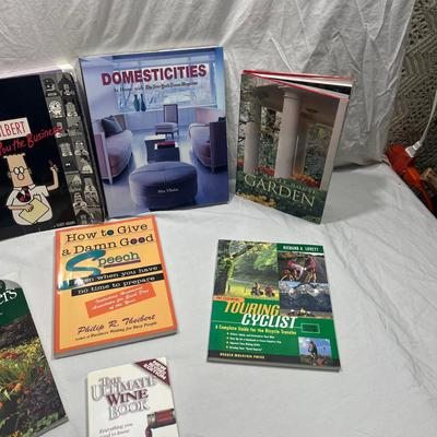 assorted books that are coffee table style books or educational