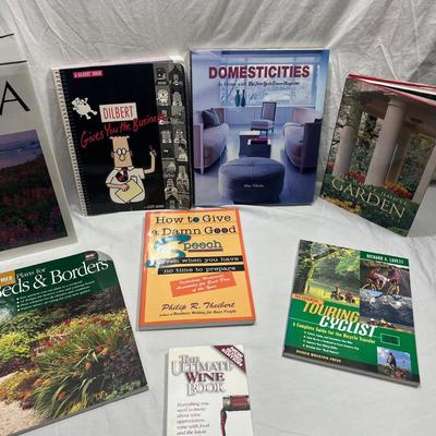 assorted books that are coffee table style books or educational