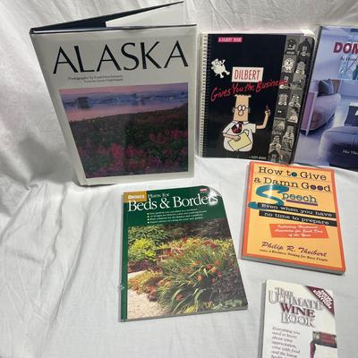 assorted books that are coffee table style books or educational