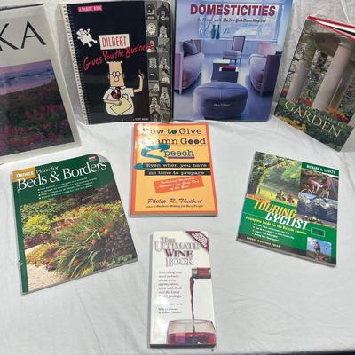 assorted books that are coffee table style books or educational