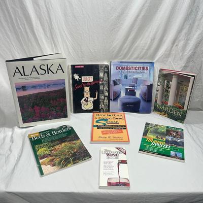 assorted books that are coffee table style books or educational