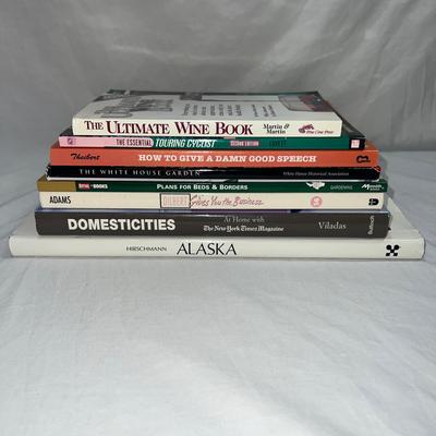assorted books that are coffee table style books or educational