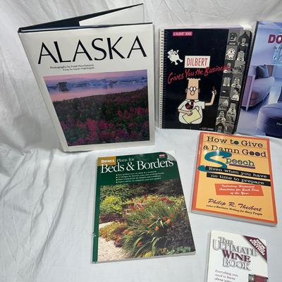 assorted books that are coffee table style books or educational