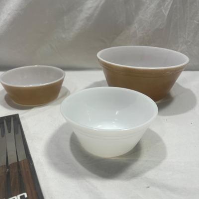 Brown and white Federal mixing bowls with vintage fondue skewers