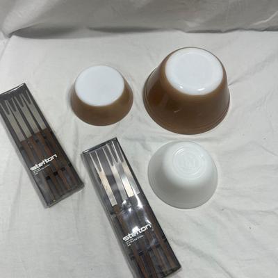 Brown and white Federal mixing bowls with vintage fondue skewers