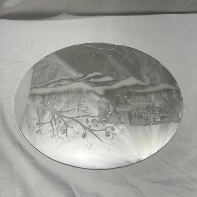 Sandblasted art onto mirror of Cabin In mountains