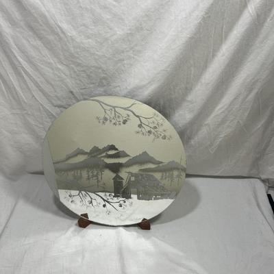 Sandblasted art onto mirror of Cabin In mountains