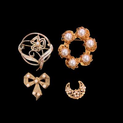 Set of Four Gold Toned Brooches