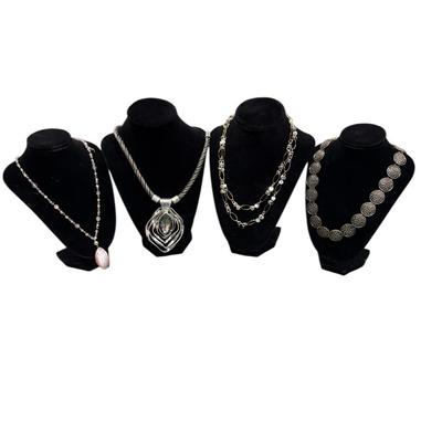 Set Of Four Silver Toned Fashion Necklaces