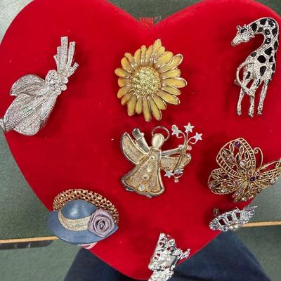 Be Still My Heart Look at all the Brooches