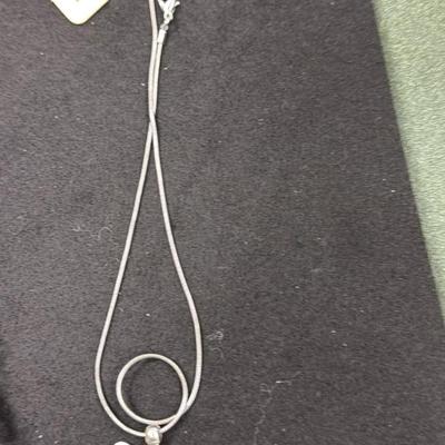 Set of 4 Silver Toned Necklaces