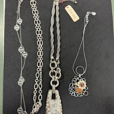 Set of 4 Silver Toned Necklaces