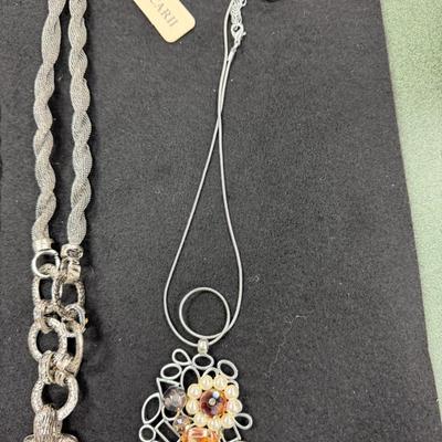 Set of 4 Silver Toned Necklaces
