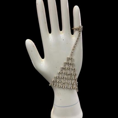 Silver toned Rhinestone Hand Chain Bracelet with an attached ring