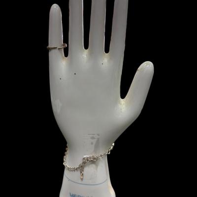 Silver toned Rhinestone Hand Chain Bracelet with an attached ring