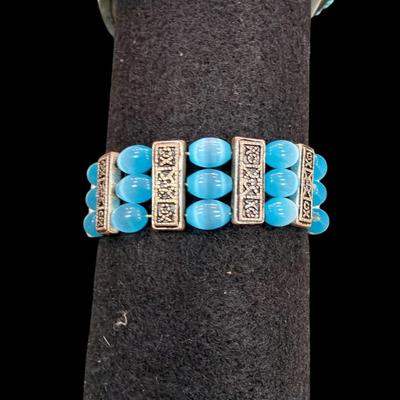 Silver Toned and Turquoise Colored Bracelets