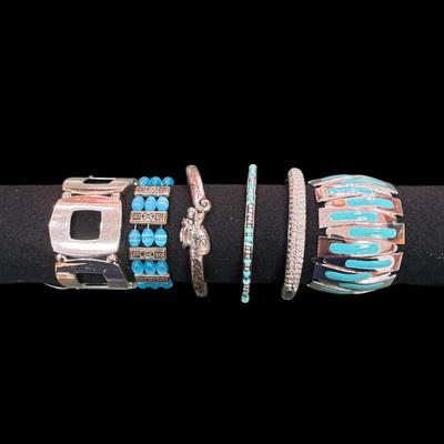 Silver Toned and Turquoise Colored Bracelets