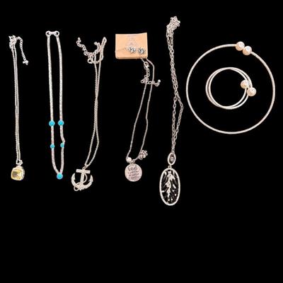 Six Silver Toned Necklaces