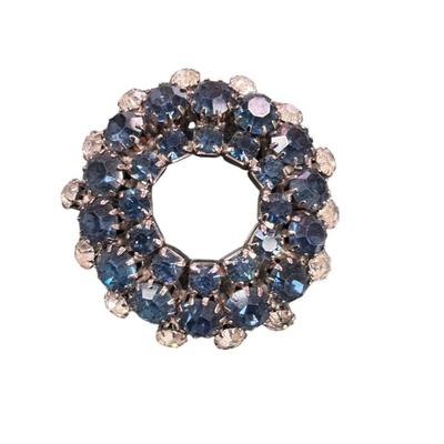 Vintage Silver Toned Rhinestone Wreath Brooch Featuring Concentric Circles of Blue and Clear Crystal