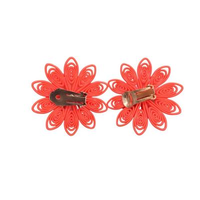 Pair Of Vintage Orange Plastic Clip On Flower Earrings with a Faux Pearl Center