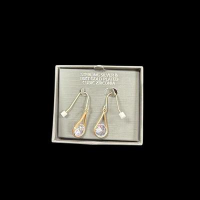 Pair of Sterling Silver and 18 kt gold plated cubic zirconia drop earrings.