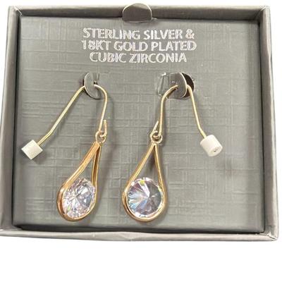 Pair of Sterling Silver and 18 kt gold plated cubic zirconia drop earrings.