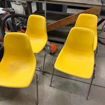 Stack of 4 vintage Yellow seat metal framed office chairs