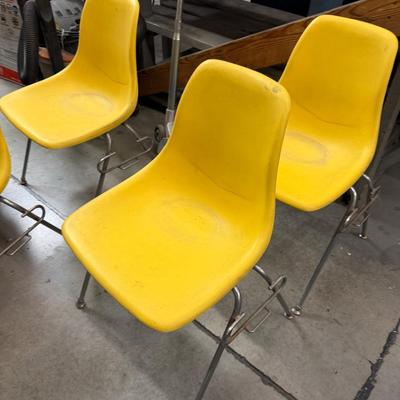 Stack of 4 vintage Yellow seat metal framed office chairs