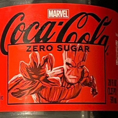 Limited-edition Marvel Coca-Cola Zero Sugar bottle label featuring Groot, 20 fl oz size.