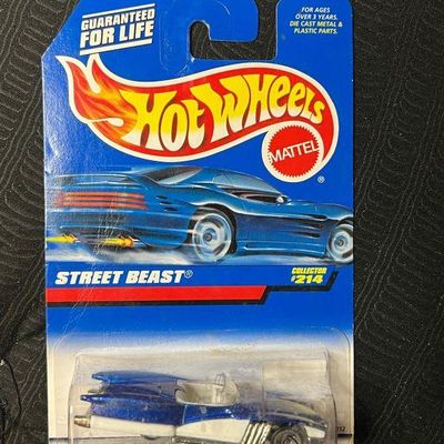 Vintage Hot Wheels die-cast Street Beast car, Collector #214, unopened in its original blue card packaging.