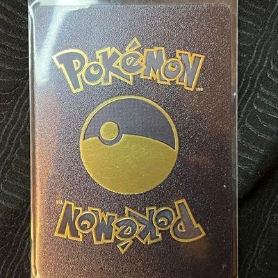 Japanese Pokémon trading card, reverse side, housed in a clear protective sleeve.