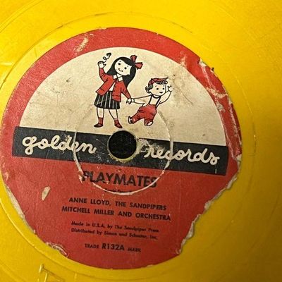Vintage Little Golden Record in bright yellow vinyl featuring 'Playmates' by Anne Lloyd and The Sandpipers, trade R132A,...
