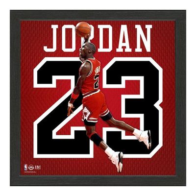 Framed Michael Jordan Chicago Bulls graphic print featuring 'JORDAN 23' typography and action shot, set in a dark wood frame.