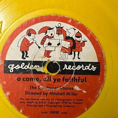 Vintage Golden Records yellow vinyl children's record featuring "O Come, All Ye Faithful" by The Sandpiper Chorus,...
