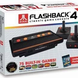 Atari Flashback 4 classic game console in its original box, featuring 75 built-in games and two wireless controllers.