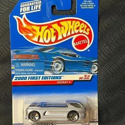 Hot Wheels 2000 First Editions Deora II die-cast toy car, new in its original blister packaging.