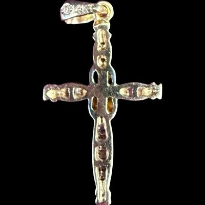 Sale Photo Thumbnail #8: This 14K yellow gold cross pendant features channel set diamonds. It measures approximately 1” long. The weight is 1.84 grams. [AG]