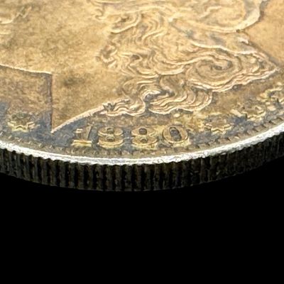 Sale Photo Thumbnail #15: This 1880-S Morgan is not graded. The silver content is 90%. [PM]