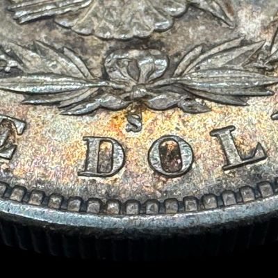 Sale Photo Thumbnail #14: This 1880-S Morgan is not graded. The silver content is 90%. [PM]
