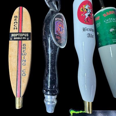 Sale Photo Thumbnail #23: This includes nine vintage beer tap handles, and one Monster bottle opener. Brands include Harpoon, Starr Hill, Miller Lite, and more. [MI]