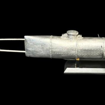 Sale Photo Thumbnail #28: The H.L. Hunley was a hand-powered combat submarine of the Confederate States Army that made history on Feb. 17, 1864, as the first submarine to sink an enemy warship. It was constructed in 1863, and measured approximately 40 feet long. It was forged from