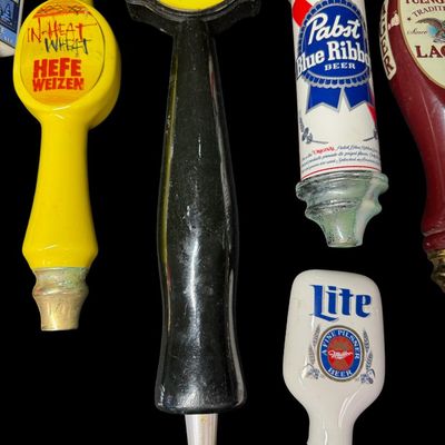 Sale Photo Thumbnail #45: This includes ten beer tap handles. Brands include PBR, Sierra Nevada, Blue Moon, and more. [MI]