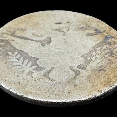 Sale Photo Thumbnail #76: This 1899 Barber half dollar is not graded. The silver content is 90%. [PM]