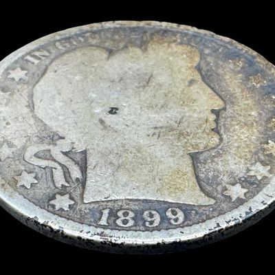 Sale Photo Thumbnail #75: This 1899 Barber half dollar is not graded. The silver content is 90%. [PM]