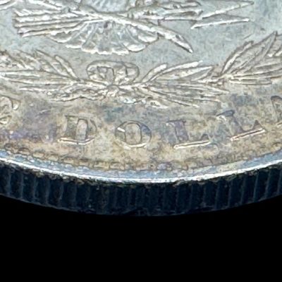 Sale Photo Thumbnail #82: This 1883 Morgan dollar is not graded. The silver content is 90%. [PM]